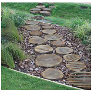 An image of a play trail of wooden stepping stones integrated into a planted verge.